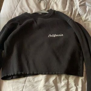 black long sleeve cropped shirt